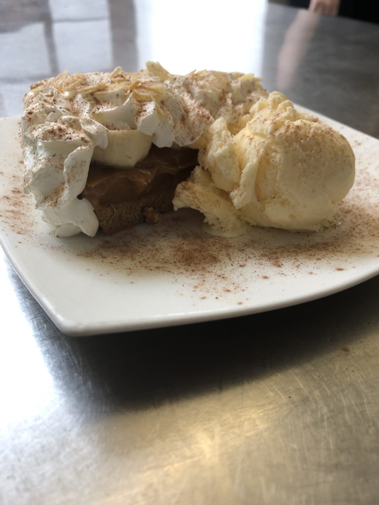 Homemade banoffee pie with vanilla ice cream